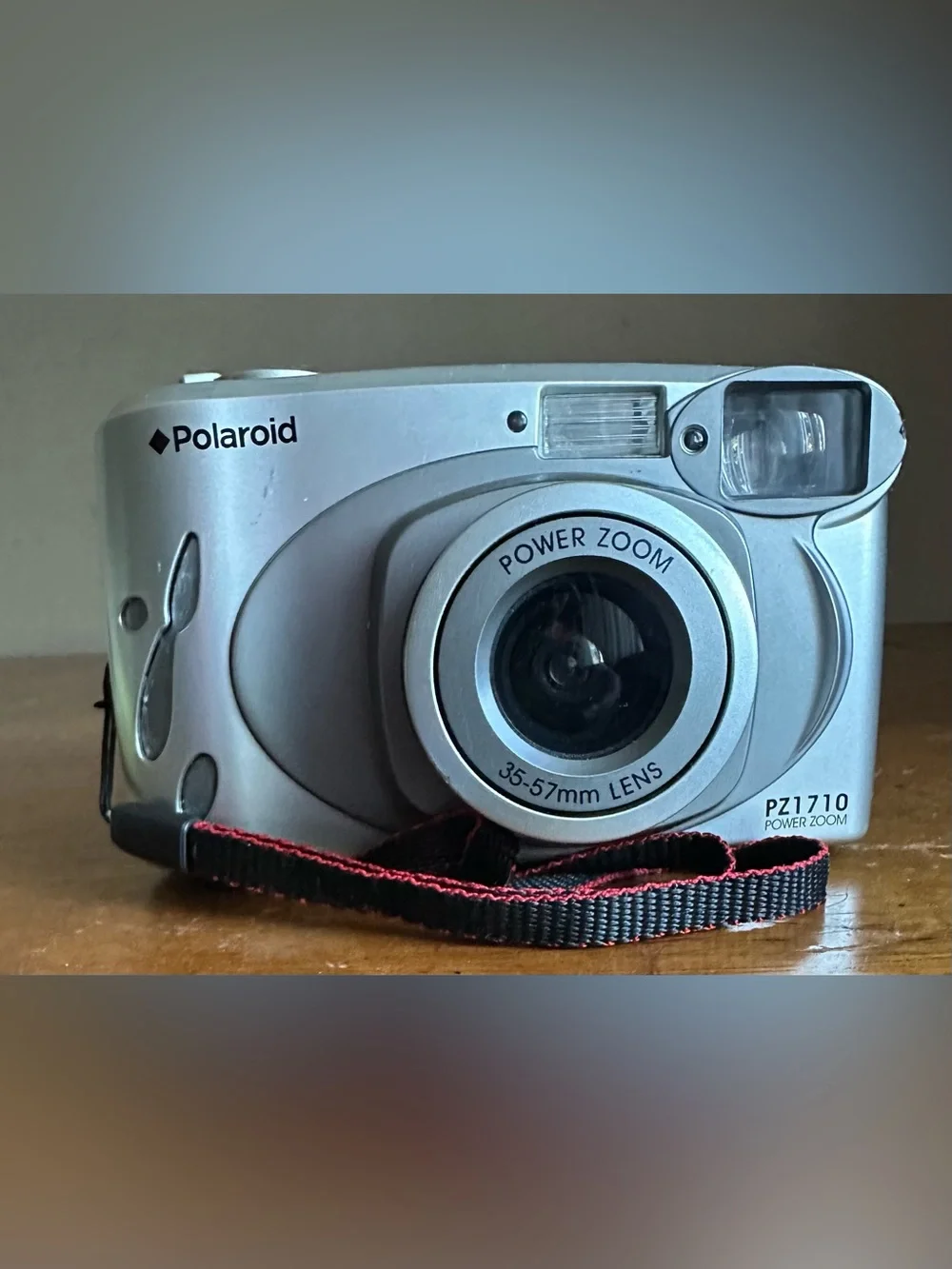 Polaroid Silver Point-and-Shoot Camera with Red-Trim Strap